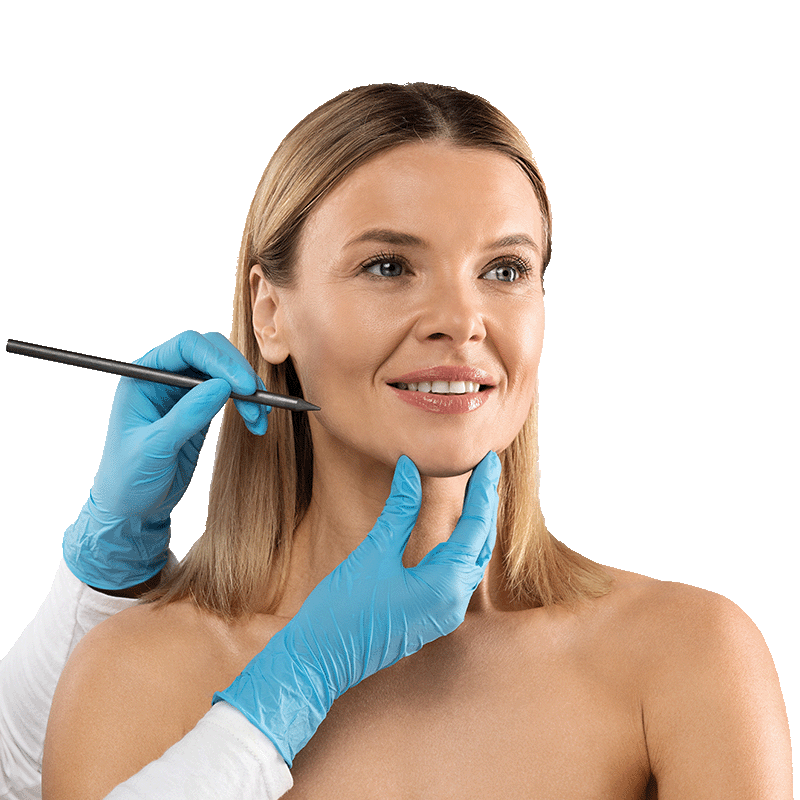 Woman being drawn on by a doctor in preparation for surgery.